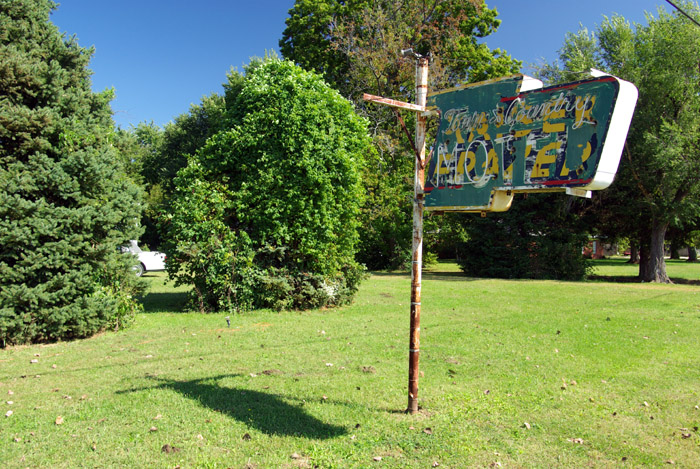 once a Kaiser-Fraze Automble sign, then Town & Country Motel, now someone's lawn art
