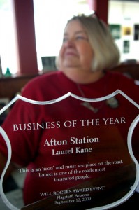 Laurel Kane with her award for Afton Station: Route 66 Business of the Year